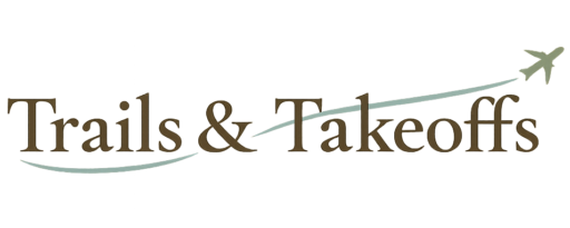 Trails and Takeoffs logo with plane trail across the words