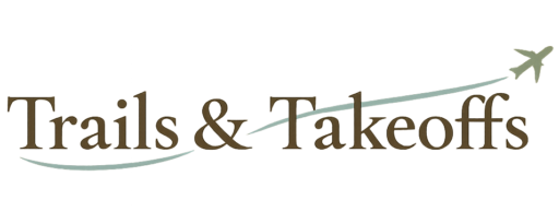 Trails and Takeoffs logo with plane trail across the words
